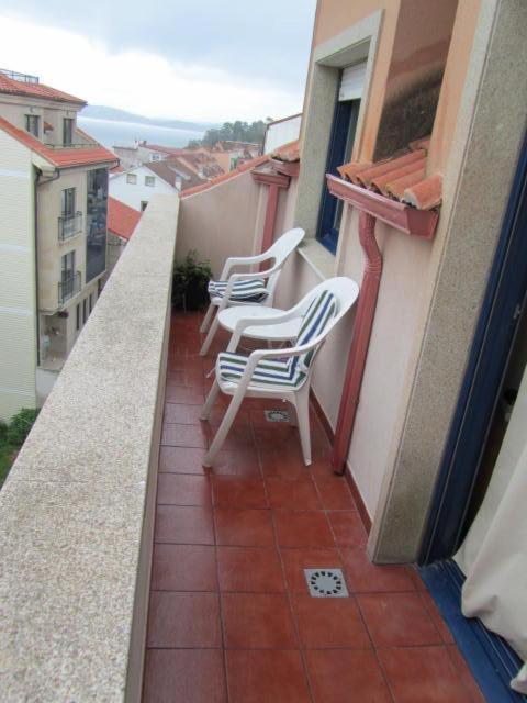 Aticos Con Terraza Vistas Urbanos 100 Playa Apartment Sanxenxo Bagian luar foto